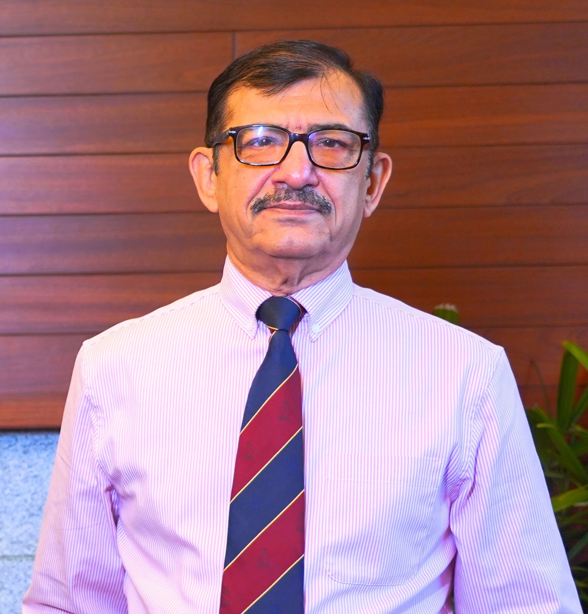Dr. Vijay Sakhuja